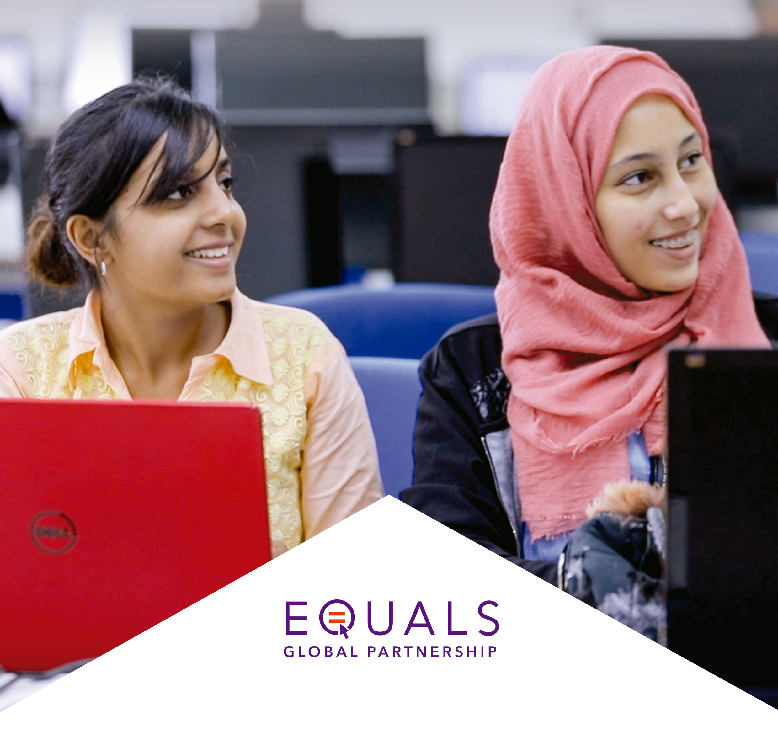 Two women sitting in front of their computers and smiling. Below the image of the women is a white triangle with the words "EQUALS Global Partnership" written in purple